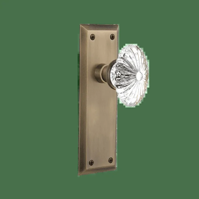 New York Long Plate with Oval Fluted Crystal Knob in Antique Brass
